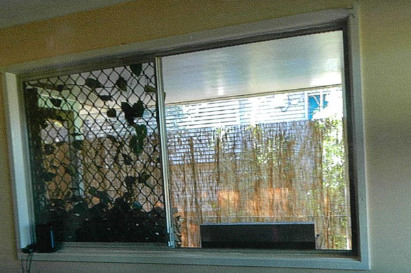 The lounge room window before, with no curtains